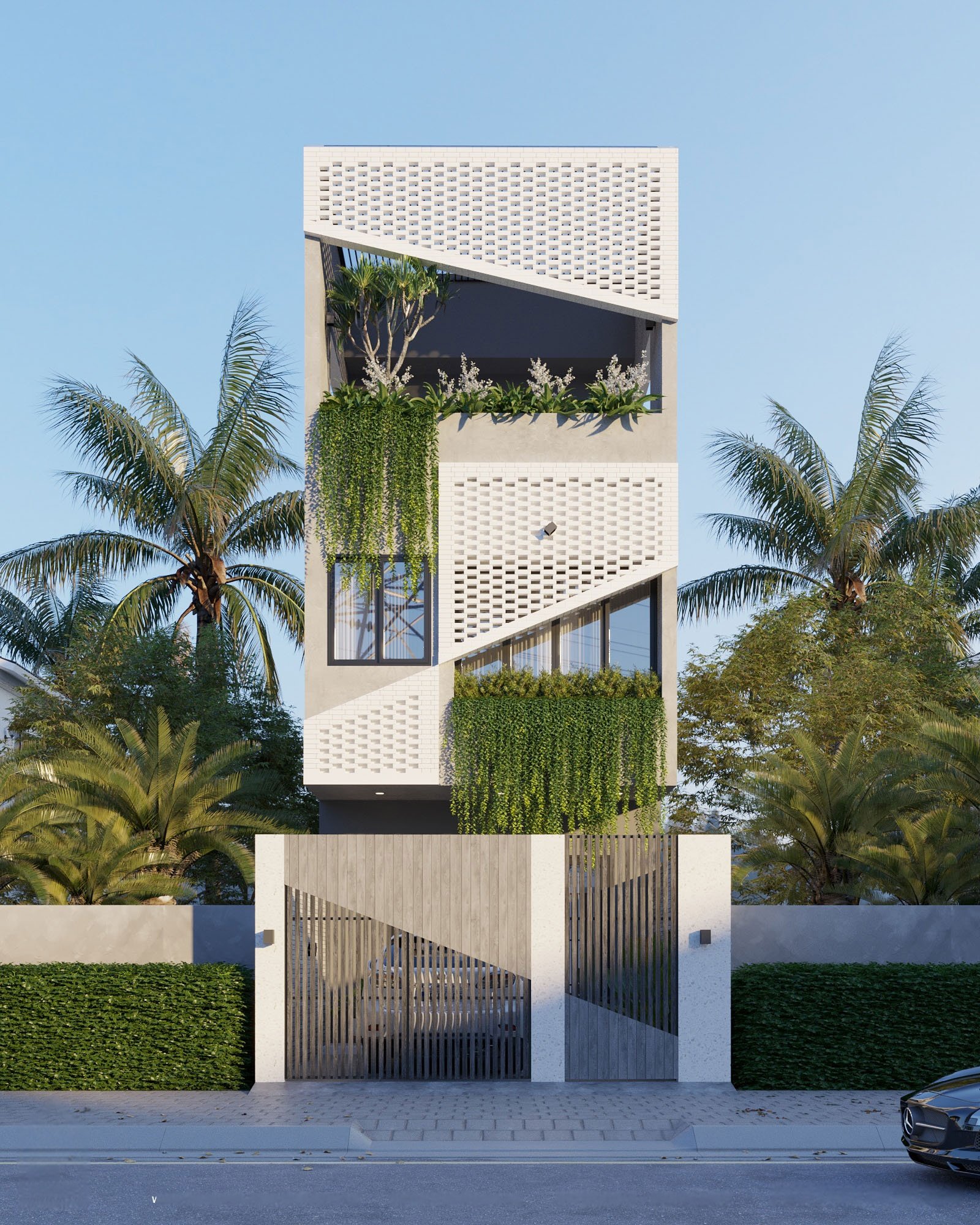 Mẫu nhà mặt tiền hướng Tây sử dụng cây xanh hài hoà với kiến trúc để tránh nắng nóng