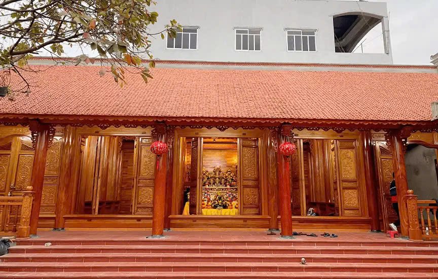 Mẫu nhà gỗ truyền thống có phòng khách đẹp mang lại cảm giác ấm cúng (Nguồn: Internet)