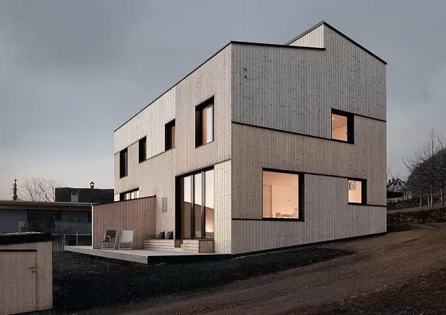 Mẫu nhà gỗ đại với thiết kế mái bằng kết hợp màu gỗ tông sáng hiện đại (Nguồn: Internet)