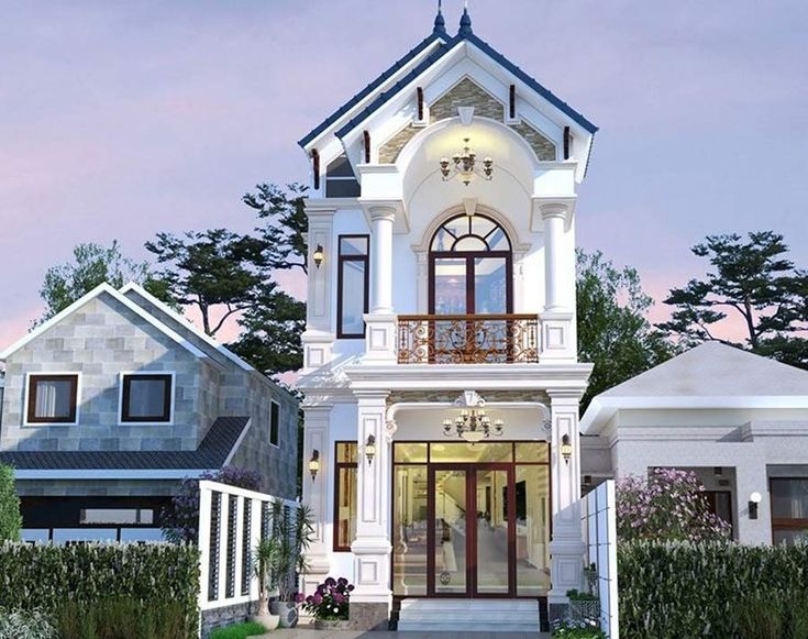 nhà mái thái 2 tầng màu trắng