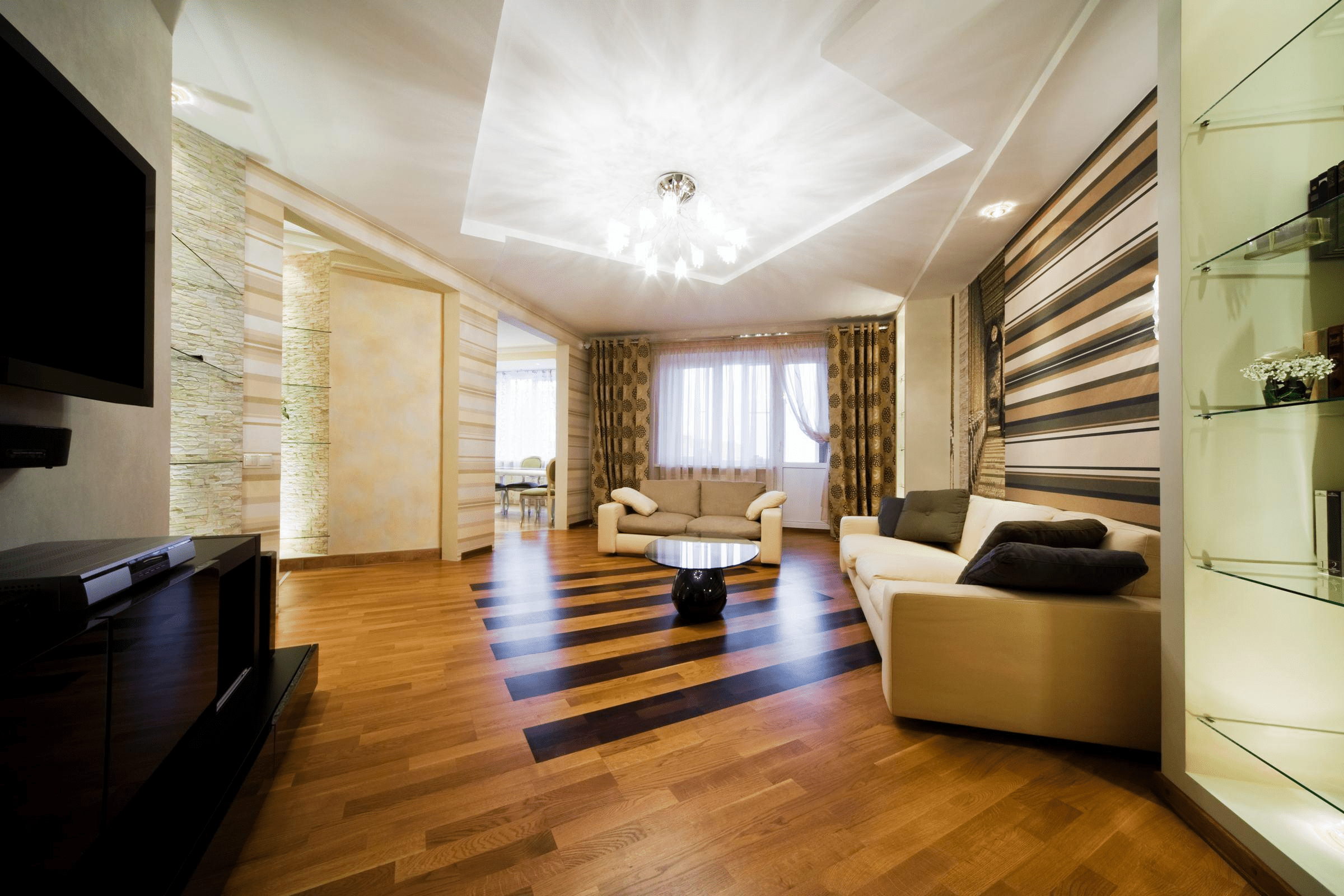 Mẫu trần thạch cao phòng khách giật cấp với hệ thống đèn chùm