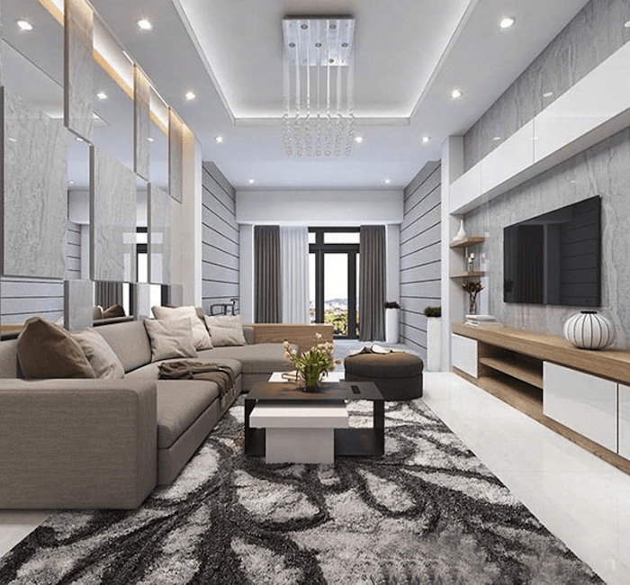 Mẫu thiết kế phòng khách nhà ống hiện đại với trần thạch cao giật cấp
